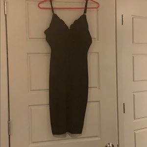 BeBe short tight black dress. Medium,34-36 C cup.